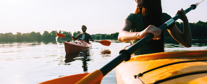 couple enjoying close amenities outdoor kayaking