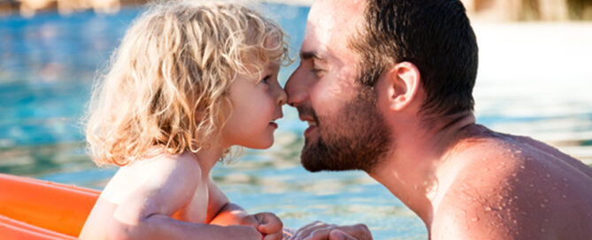 Family in Pratt home pool