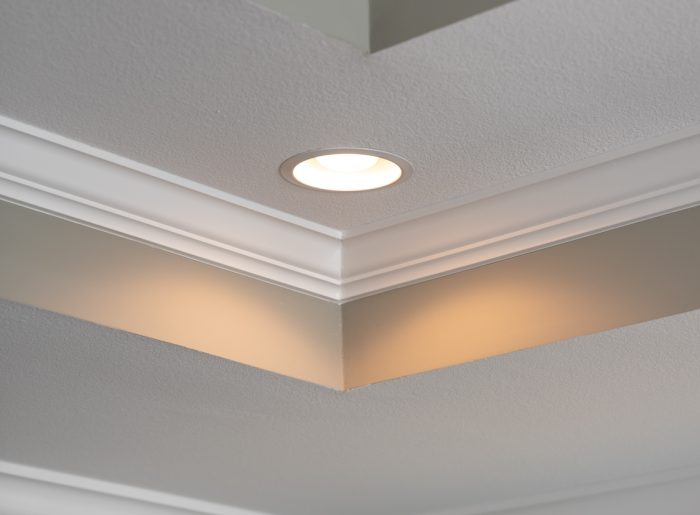 Tray ceiling details in this designer new home