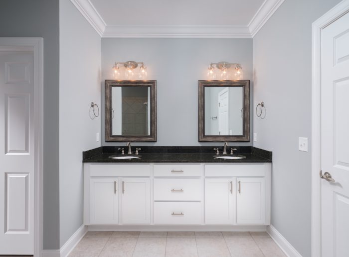 Primary ensuite with double vanity and designer finishes