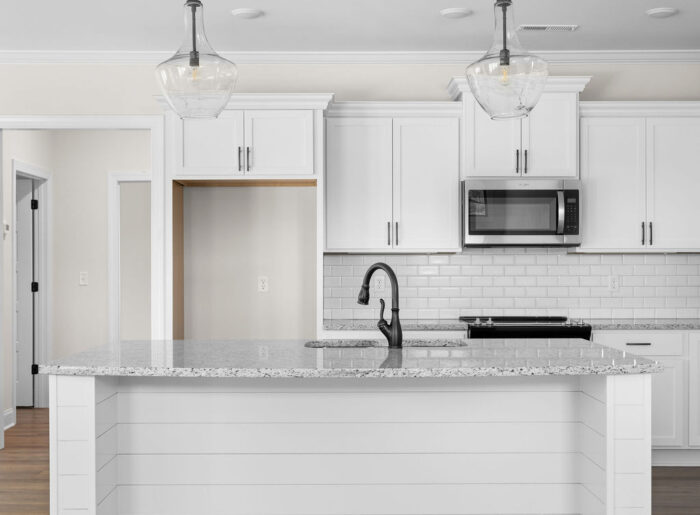 Chef's kitchen with designer upgrades in new Pratt construction