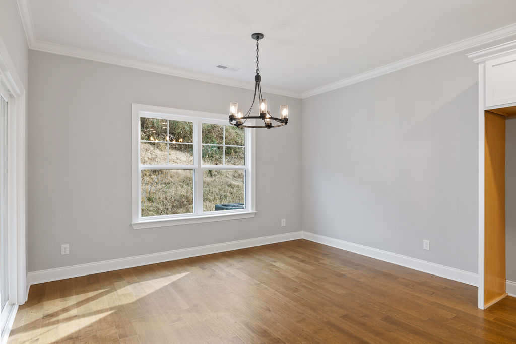 Dining room provides modern design in this townhome now selling in Hixson TN by Pratt Home Builders