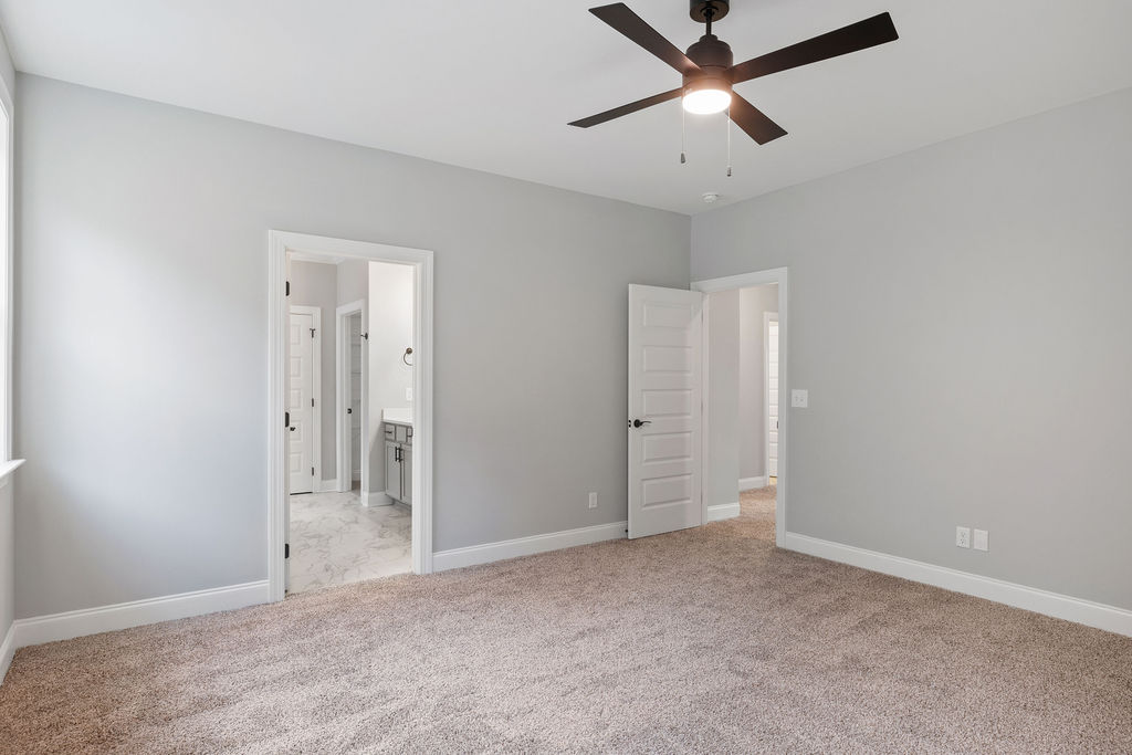 Primary suite opens to primary bath in this new home selling in Hixson TN by Pratt Home Builders