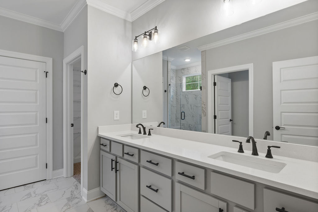 Modern Primary Bathroom with designer finishes