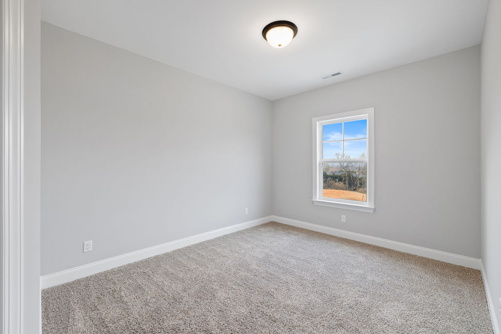 Secondary bedroom for guests or children in this new townhome in Chattanooga now selling