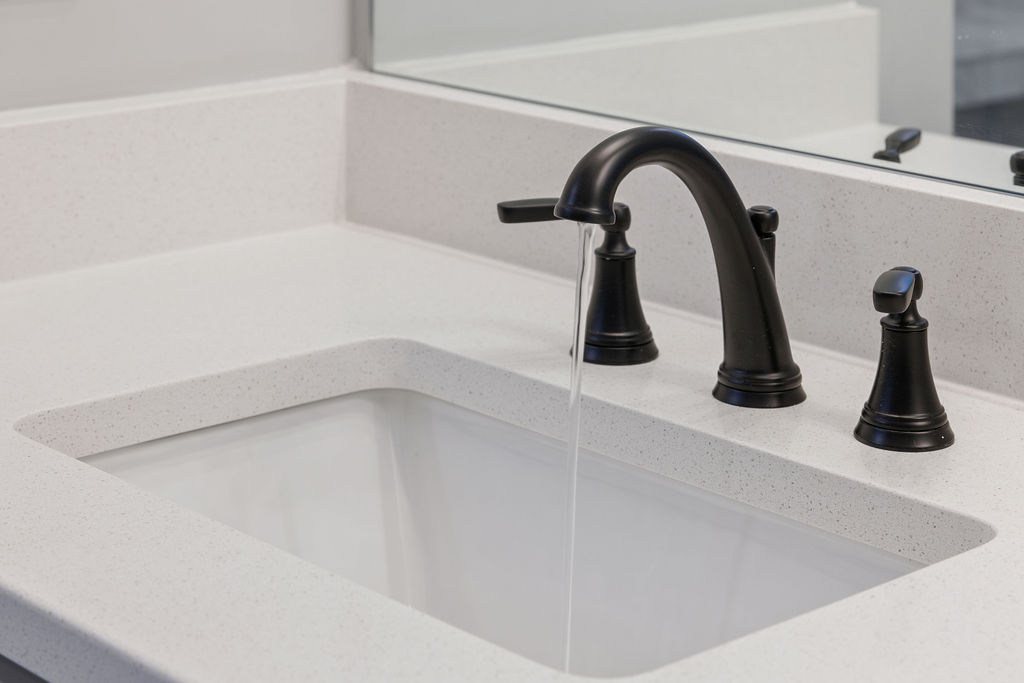 Designer finishes create a timeless primary bathroom