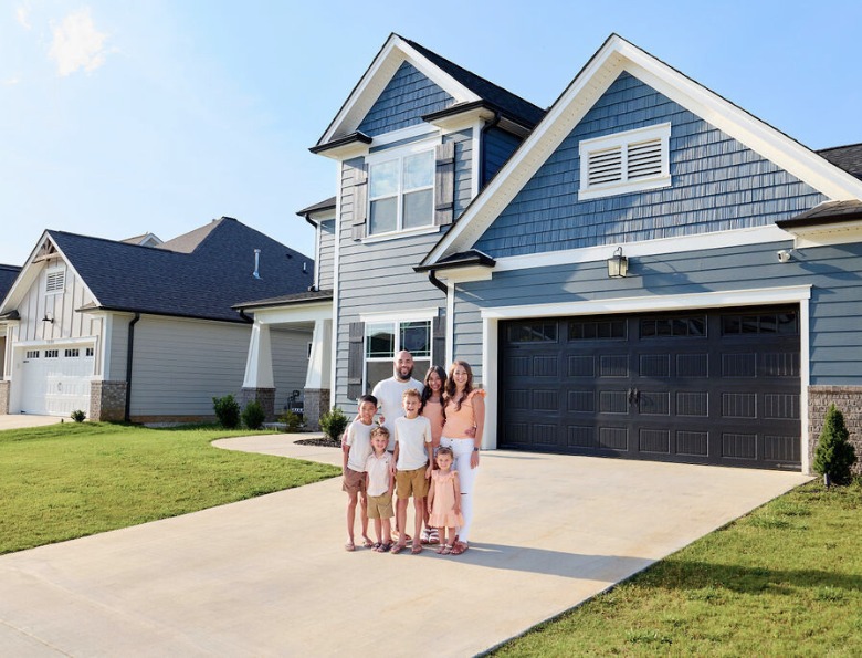 Happy Family moving into a Pratt Home Happy Family moving into a Pratt Home