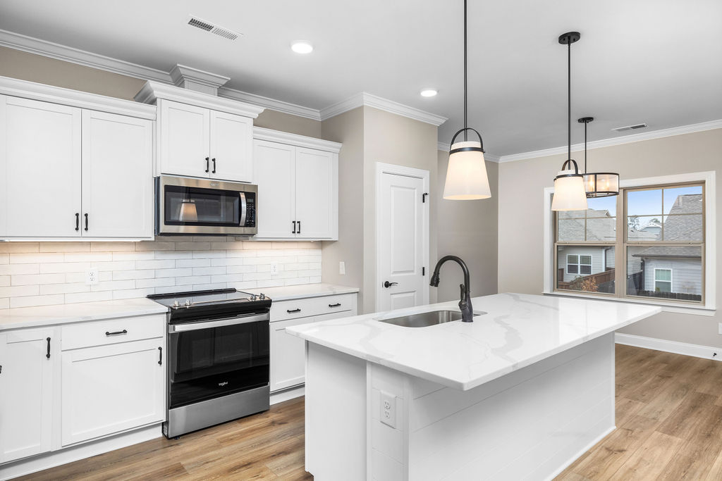 Gourmet kitchen in new home selling now