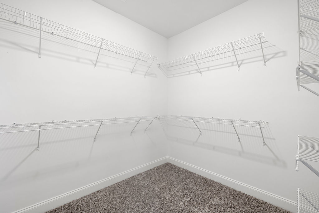 Oversized walk-in closet provides extra space for storage