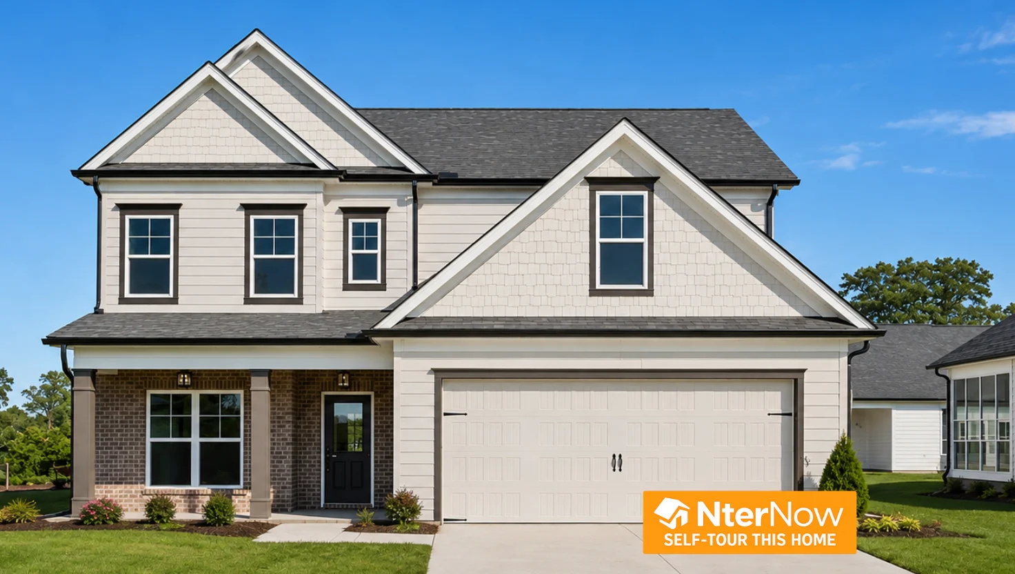 Two-story home with modern design, brick accents, and a two-car garage by Pratt Home Builders in Chattanooga TN, with NterNow self-tour sign.