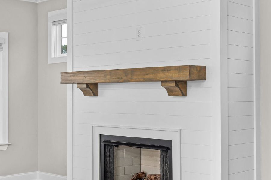Fireplace in open great room 4 bedroom 3 bath new Pratt home for sale