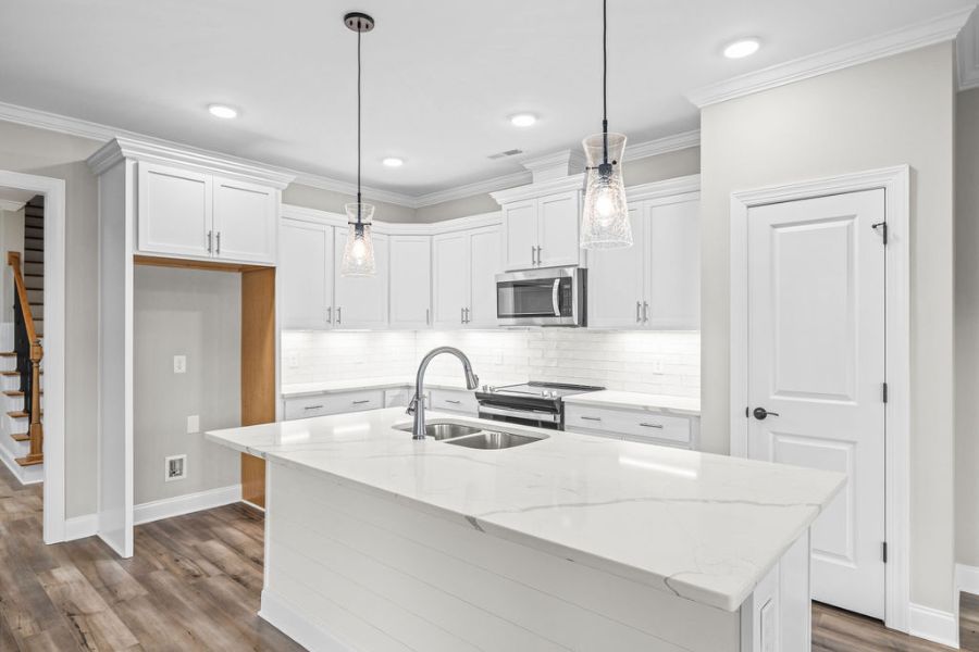Chef inspired kitchen in 4 bedroom 3 bath new construction home