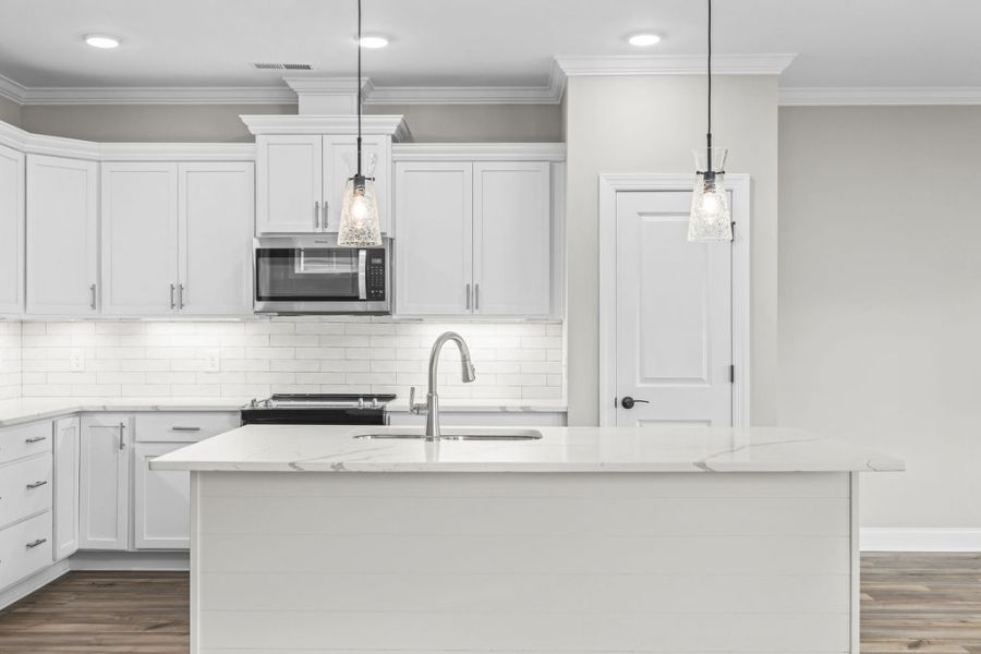 Chef inspired kitchen in 4 bedroom 3 bath new construction home