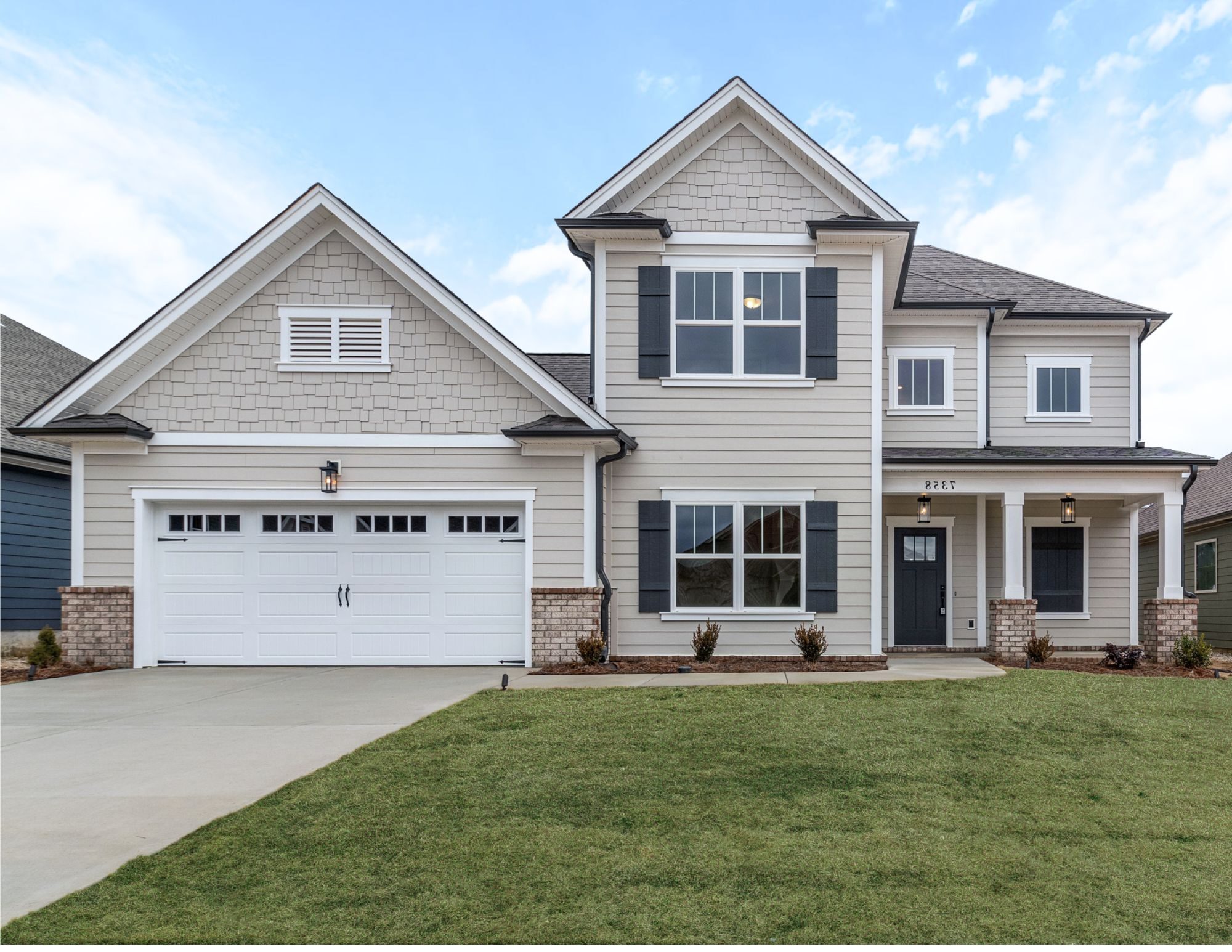 Front exterior of the Peyton home plan in Bainbridge Park Ooltewah TN by Pratt Home Builders