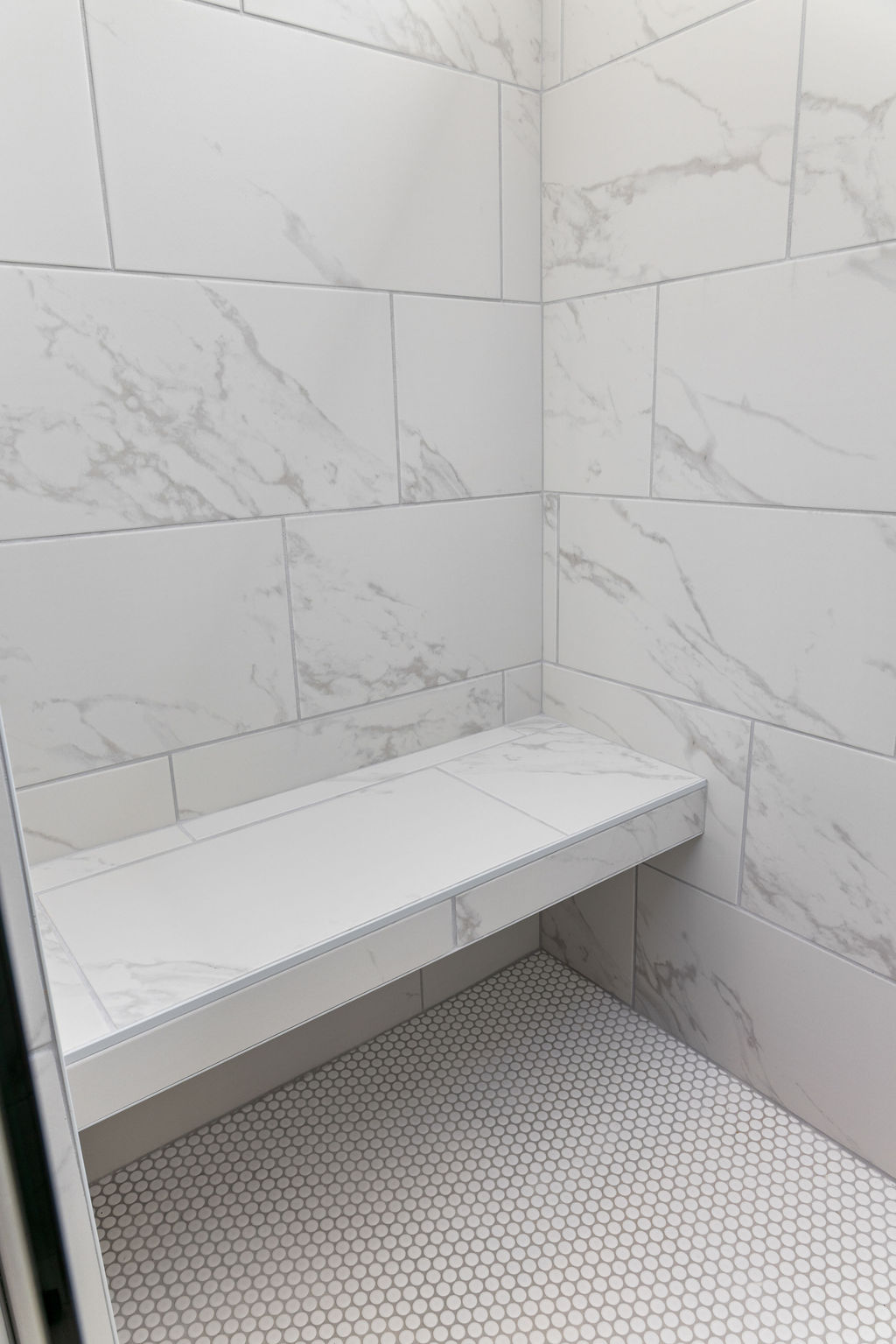 Built in bench shower detail in new Pratt home