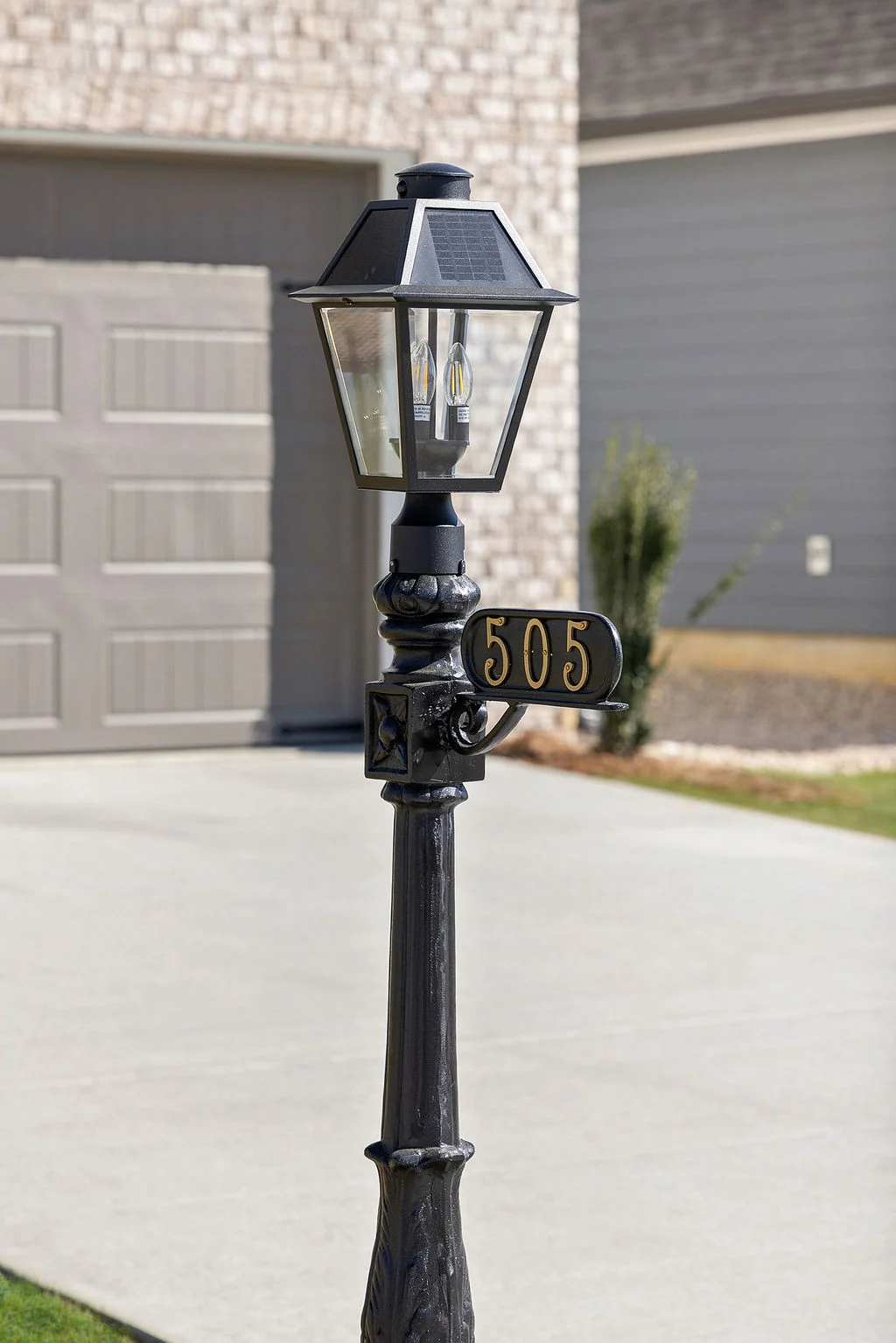 New Home Chattanooga TN. Black lamp post with house number 505 stands on a driveway outside a home by Pratt Home Builders.