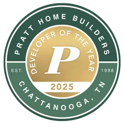 Award badge for Pratt Home Builders in Chattanooga TN, featuring "Developer of the Year 2025" with a gold center and green border.