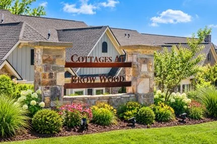 Pratt Living Blog Images (2) Cottages at Brow Wood entrance with colorful landscaping and stone sign, built by Pratt Home Builders in Chattanooga TN.